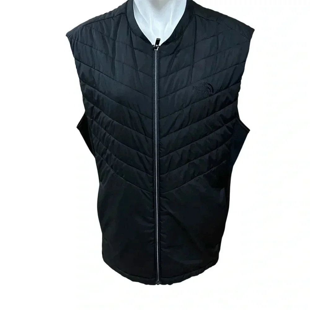 The North Face black puffer vest full front zip, pockets, front and back logo